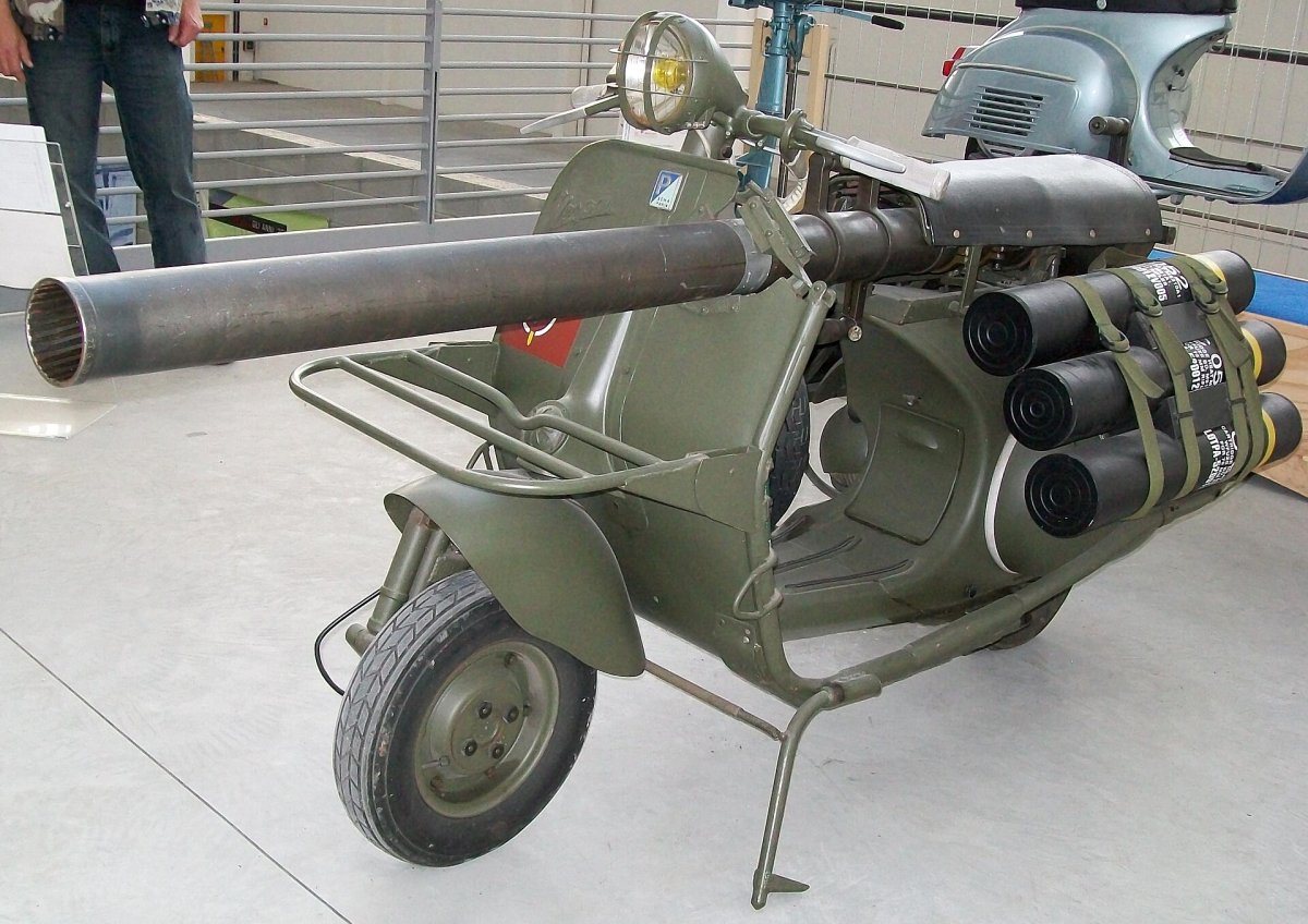 The absurd combination of scooter and weapon
